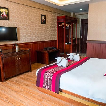 @Siam Hotel Jinghong Bagian luar foto