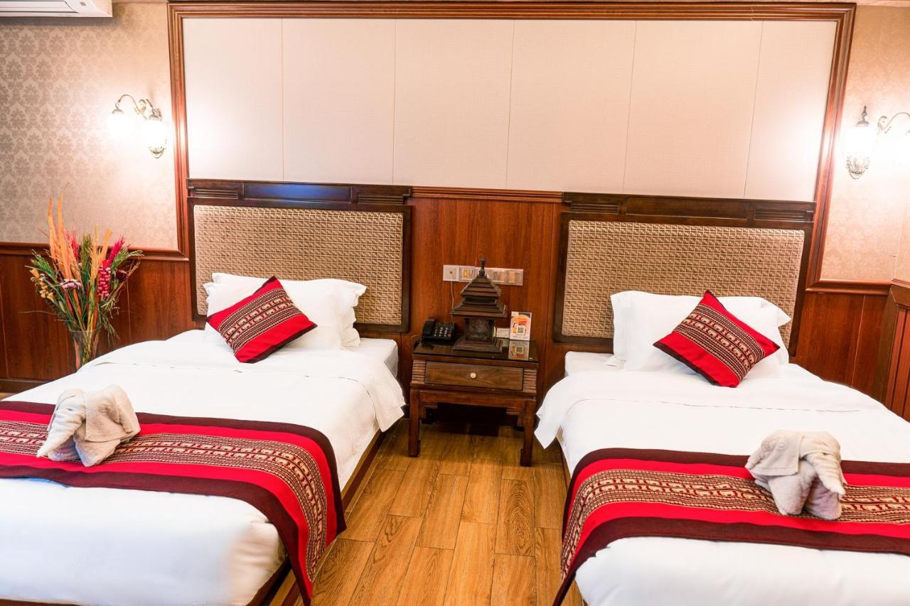@Siam Hotel Jinghong Bagian luar foto