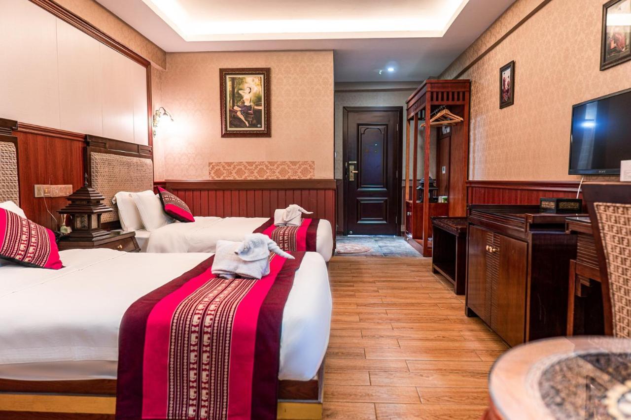 @Siam Hotel Jinghong Bagian luar foto
