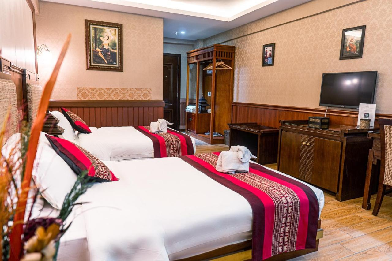 @Siam Hotel Jinghong Bagian luar foto