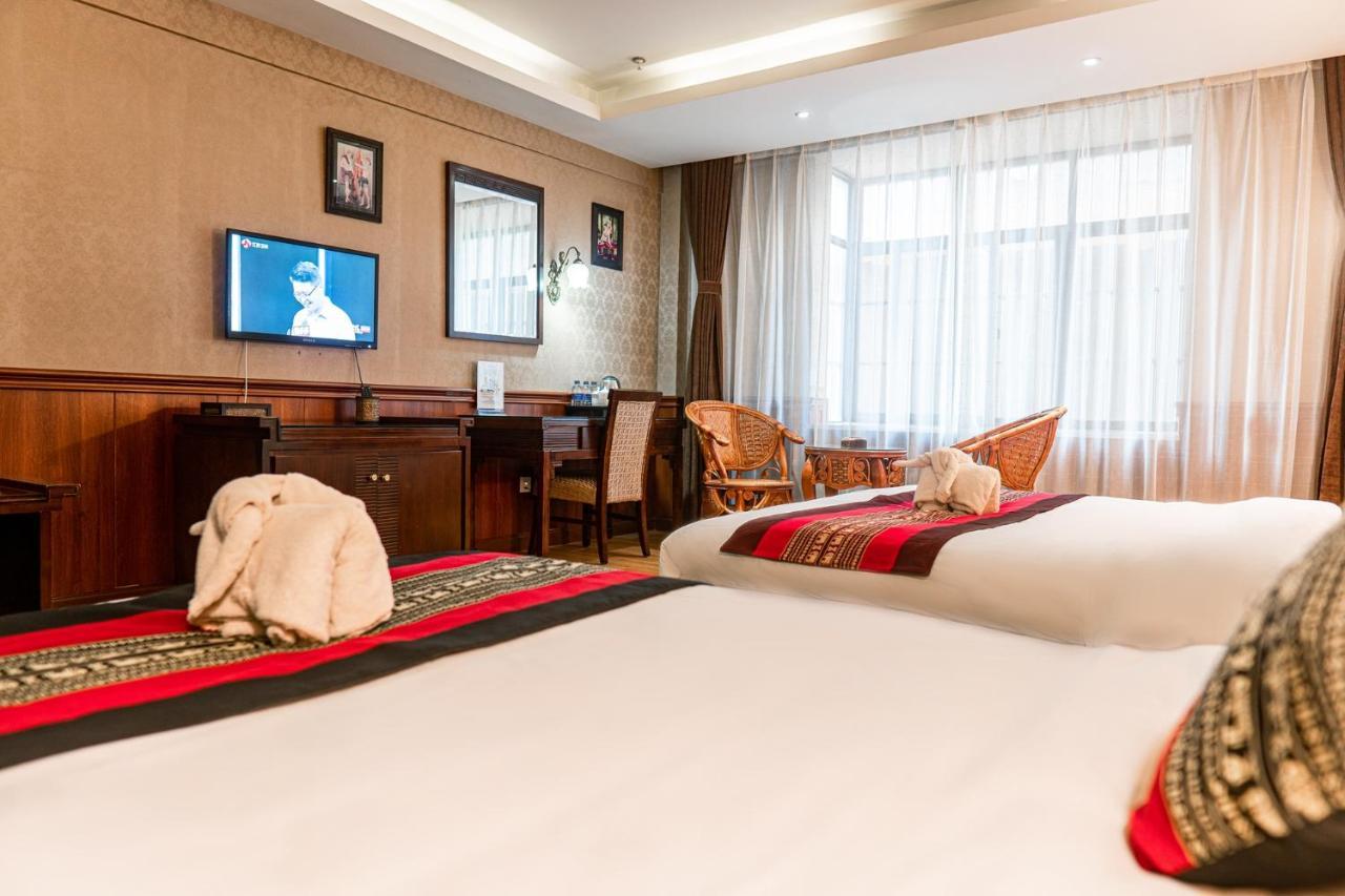 @Siam Hotel Jinghong Bagian luar foto