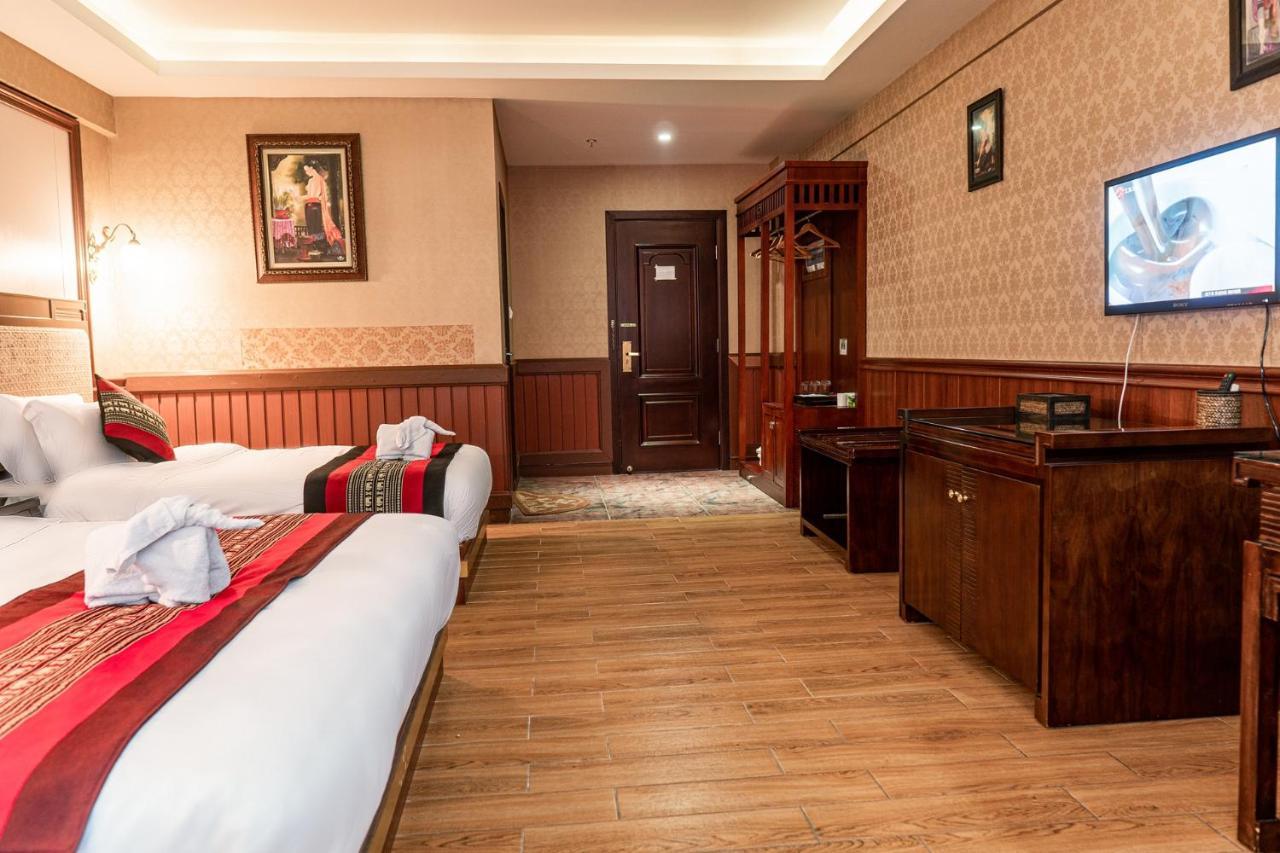 @Siam Hotel Jinghong Bagian luar foto