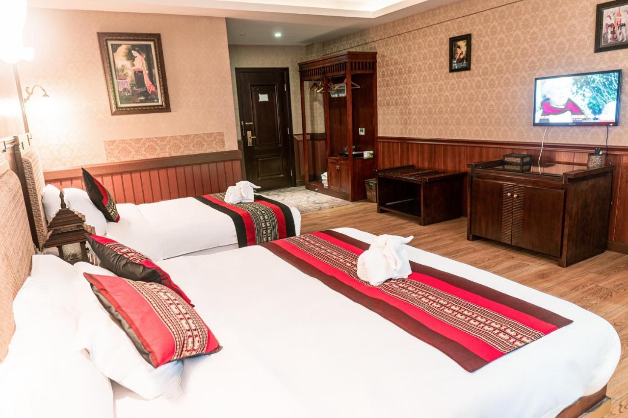 @Siam Hotel Jinghong Bagian luar foto