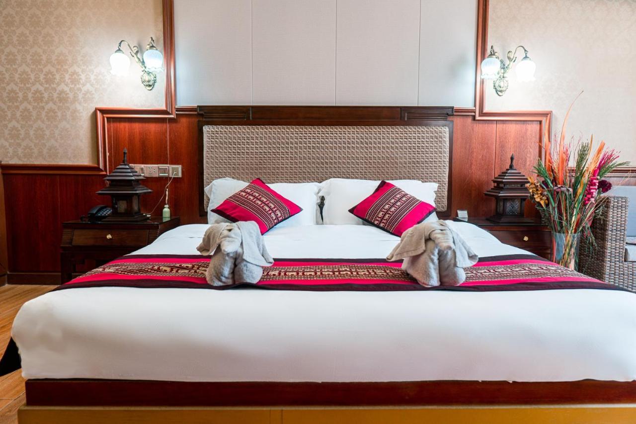 @Siam Hotel Jinghong Bagian luar foto