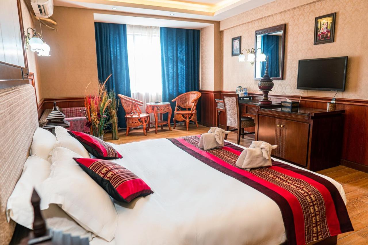 @Siam Hotel Jinghong Bagian luar foto