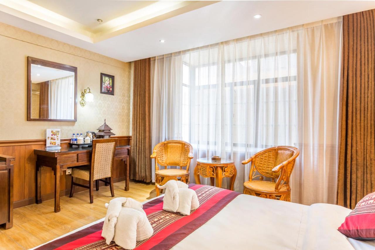 @Siam Hotel Jinghong Bagian luar foto