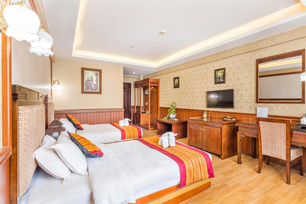 @Siam Hotel Jinghong Bagian luar foto