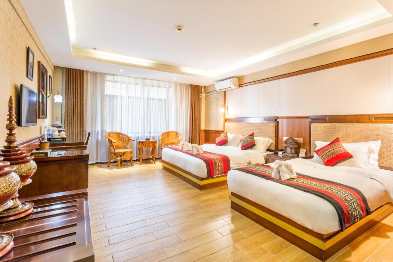 @Siam Hotel Jinghong Bagian luar foto