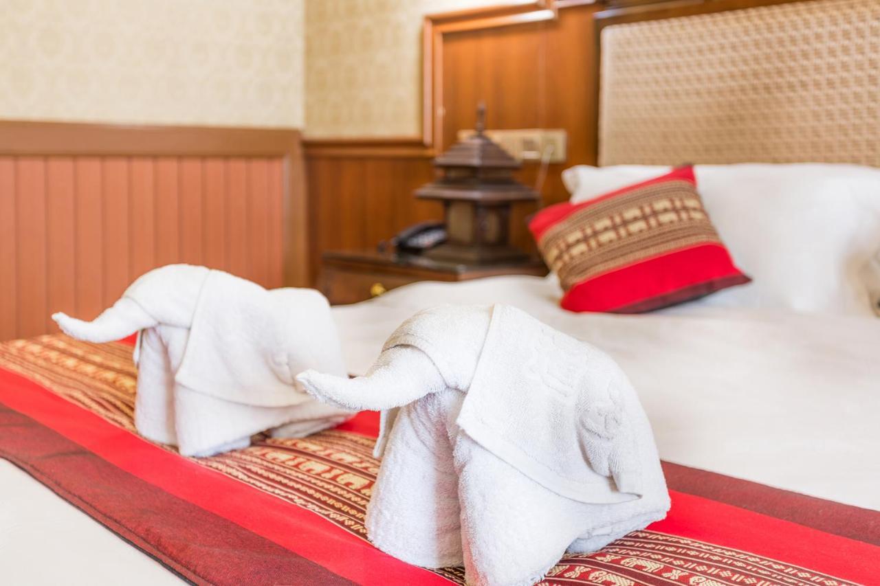 @Siam Hotel Jinghong Bagian luar foto